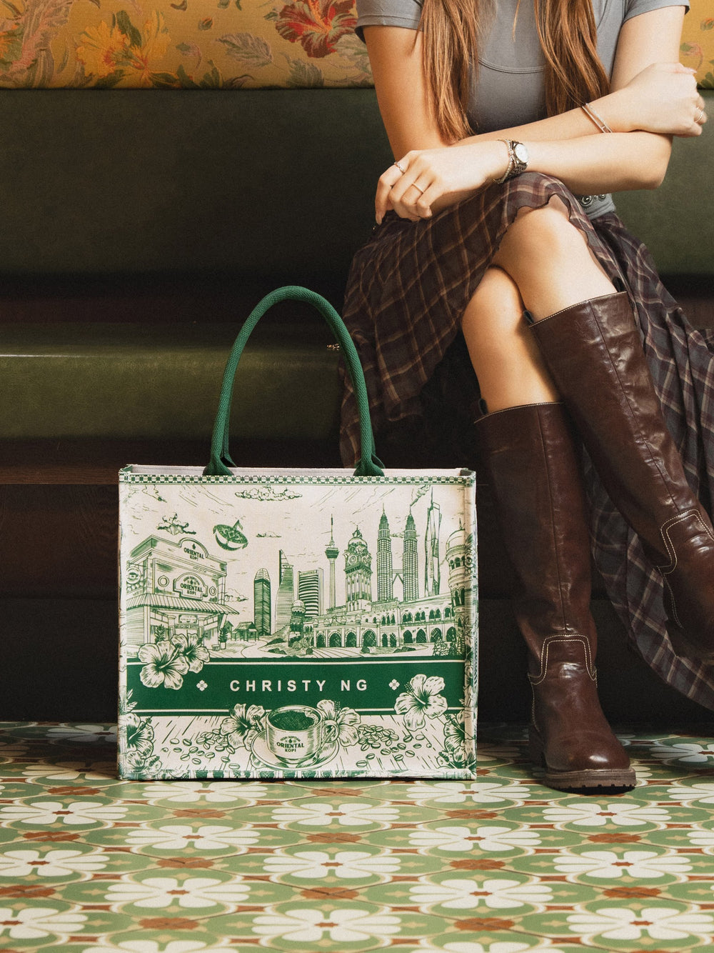 Christy Ng x Oriental Kopi tote beside a kopitiam booth
